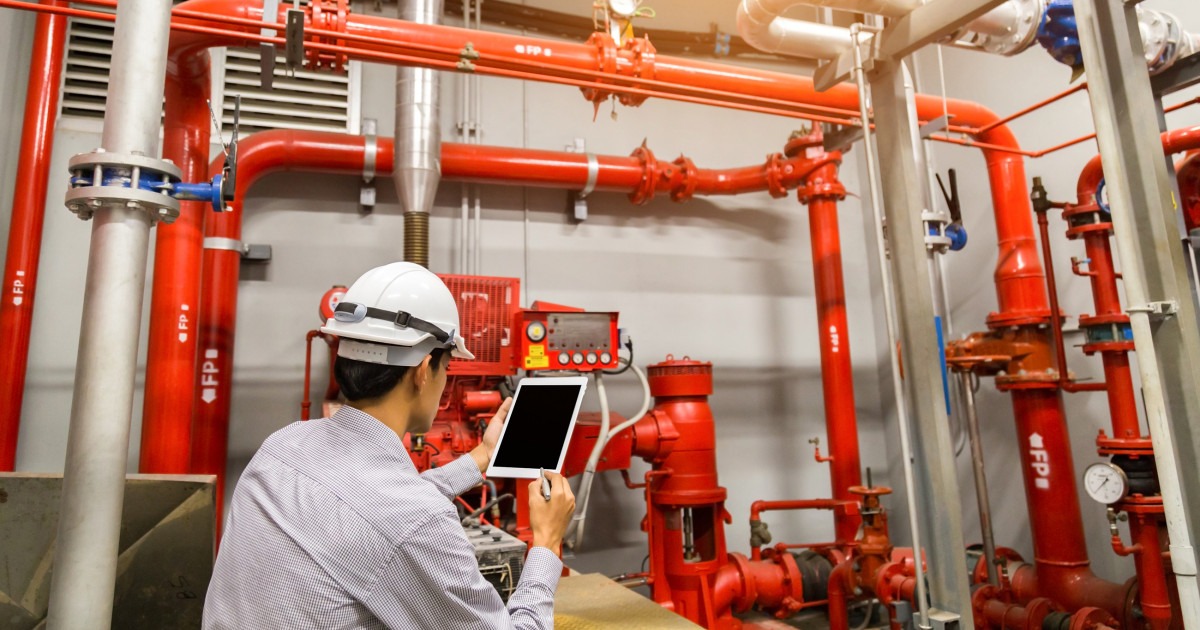 Fire protection system design with sprinkler pipes and fire safety equipment in building